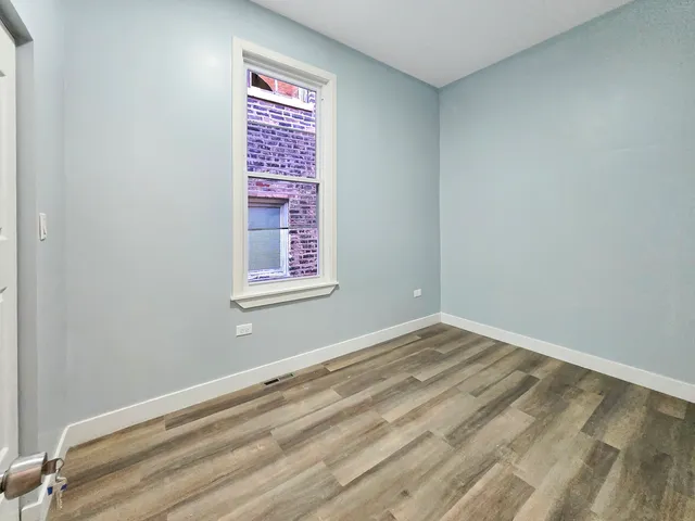 a view of a room that has a window in it