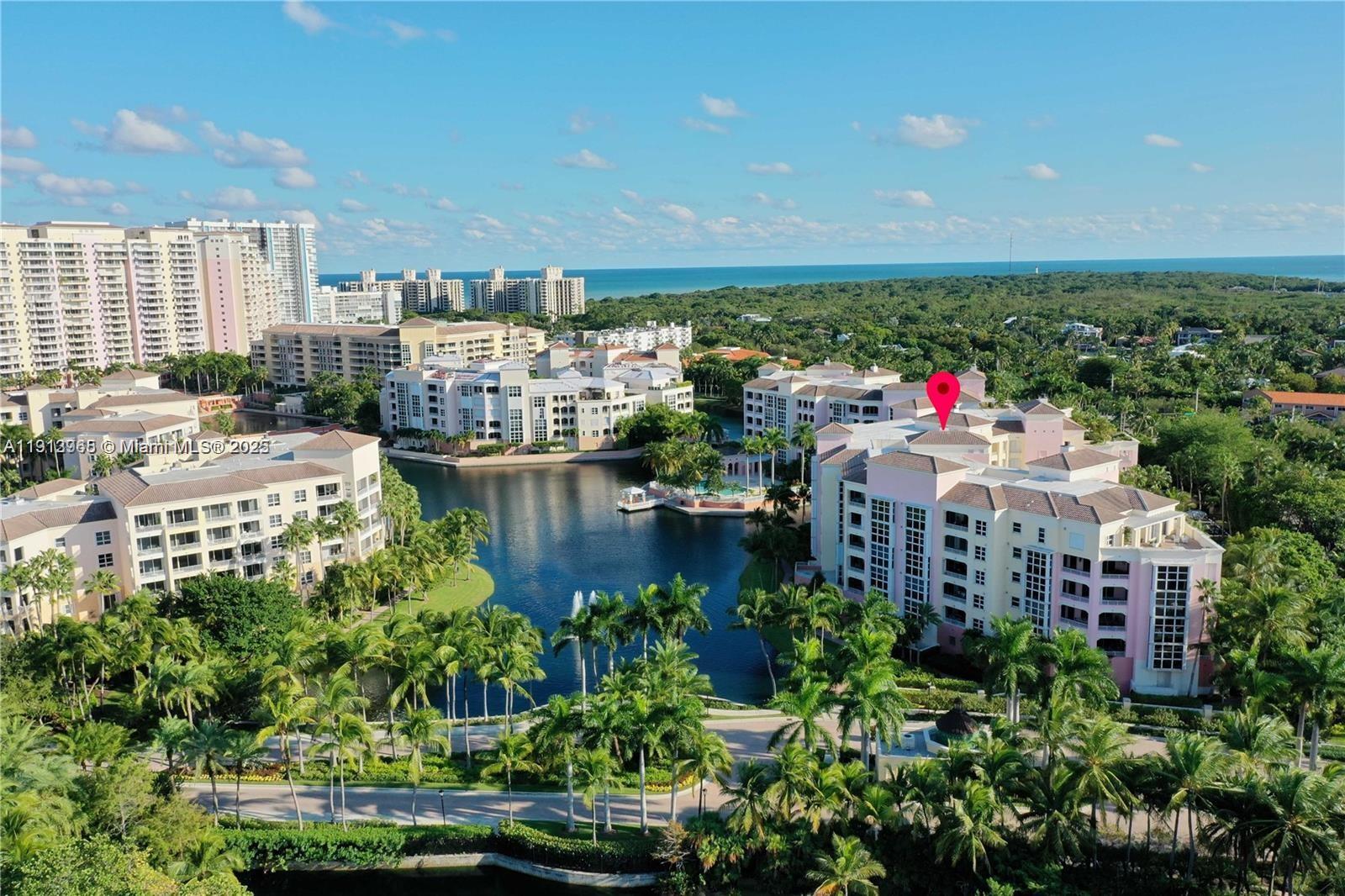 721 Crandon Boulevard, Unit 207 Key Biscayne, FL 33149 - Photo 3 of 8 a balcony with lots of green space and plants