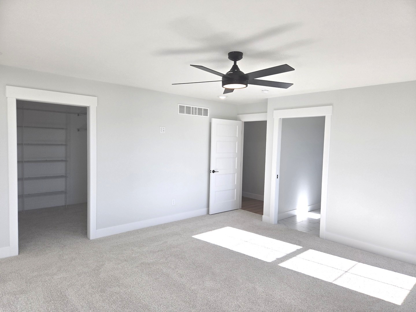 2203 Corrigan Way Normal, IL 61761 - Photo 17 of 51 a view of a big room with wooden floor and closet area
