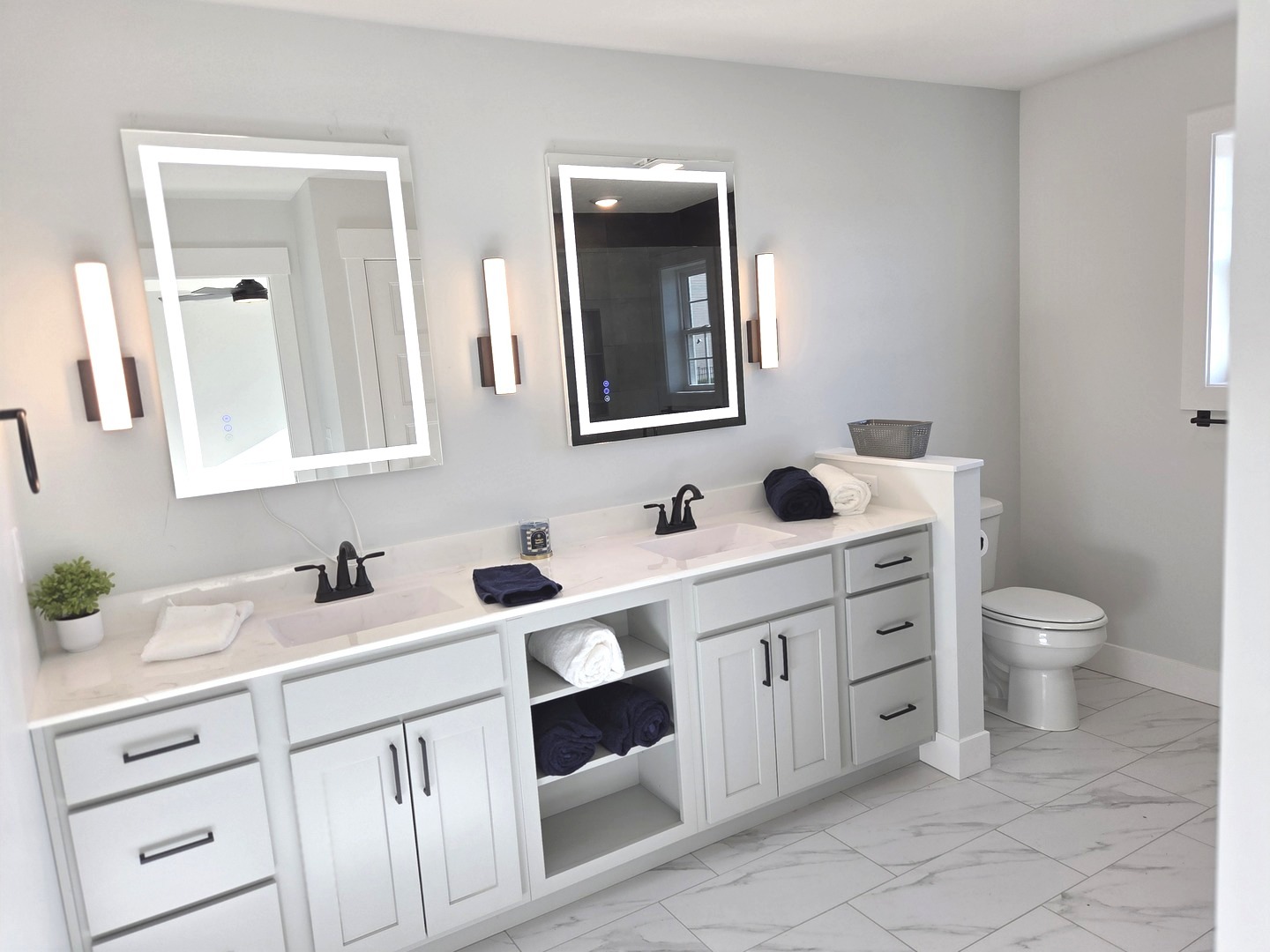 2203 Corrigan Way Normal, IL 61761 - Photo 18 of 51 a bathroom with a toilet sink and mirror