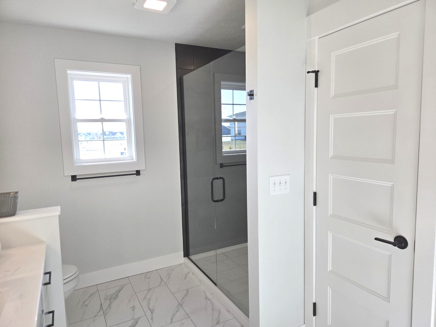 2203 Corrigan Way Normal, IL 61761 - Photo 19 of 51 a bathroom with a shower and toilet