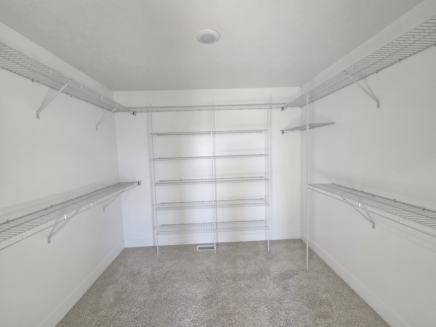 2203 Corrigan Way Normal, IL 61761 - Photo 20 of 51 a view of an empty walk in closet