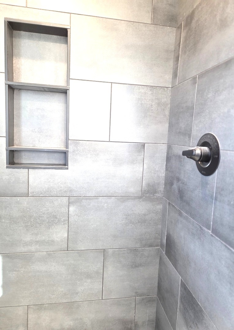 2203 Corrigan Way Normal, IL 61761 - Photo 21 of 51 a bathroom with a shower