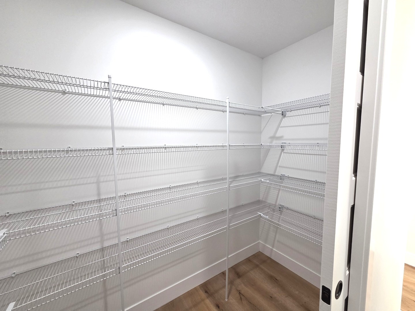 2203 Corrigan Way Normal, IL 61761 - Photo 32 of 51 a view of a room with racks on the wall