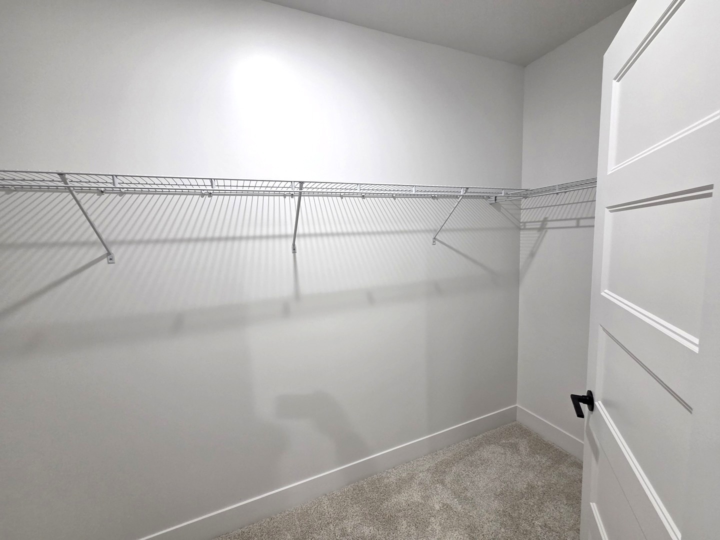 2203 Corrigan Way Normal, IL 61761 - Photo 42 of 51 a view of a room with racks on the wall