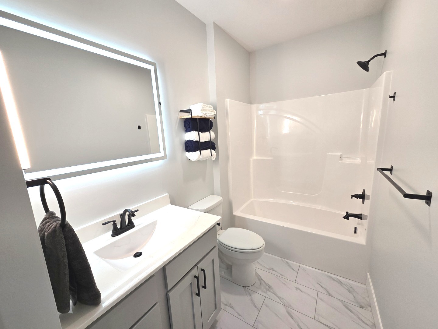 2203 Corrigan Way Normal, IL 61761 - Photo 44 of 51 a bathroom with a sink a toilet and a bathtub