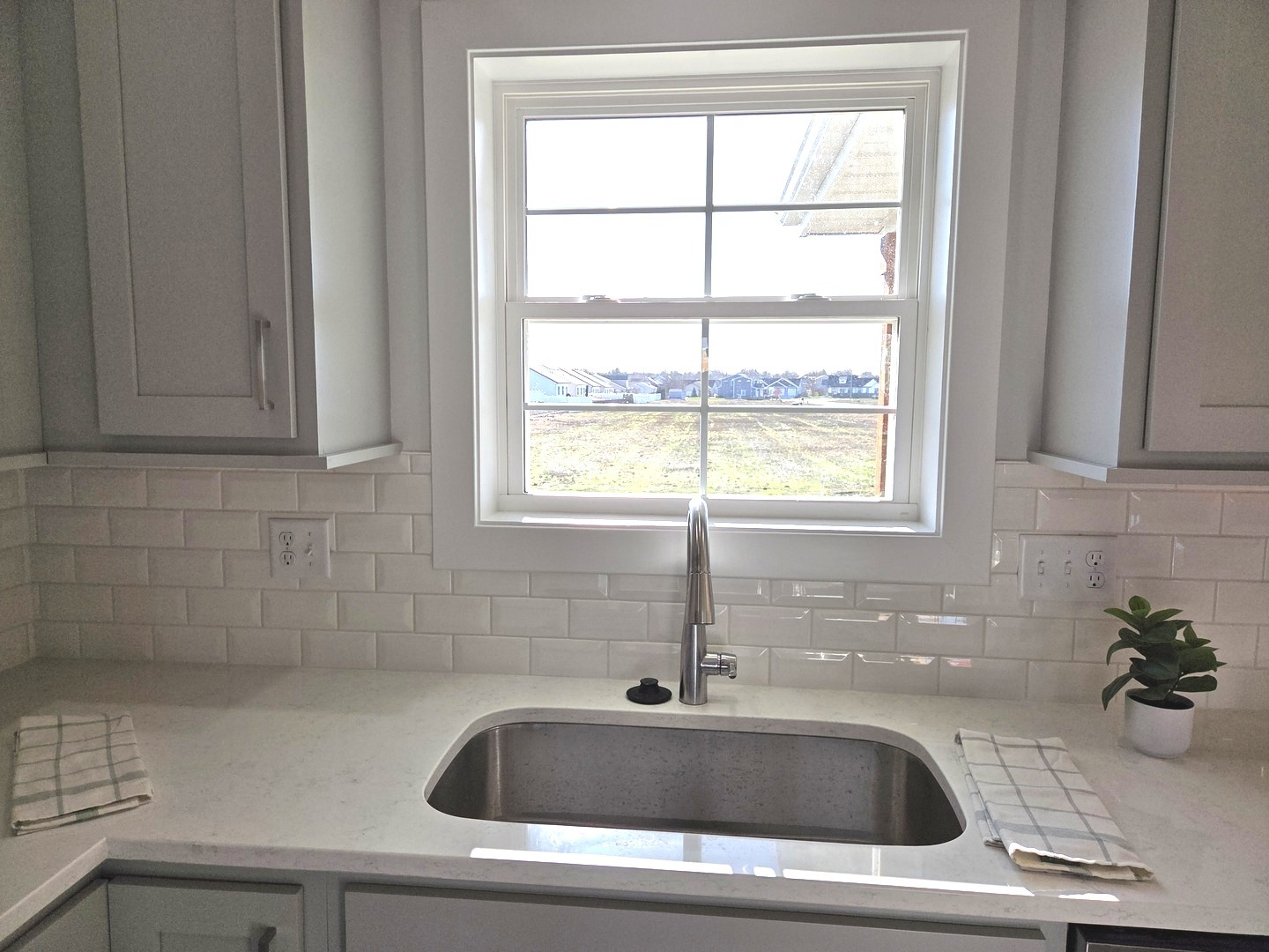 2203 Corrigan Way Normal, IL 61761 - Photo 7 of 51 a close view of sink and tap