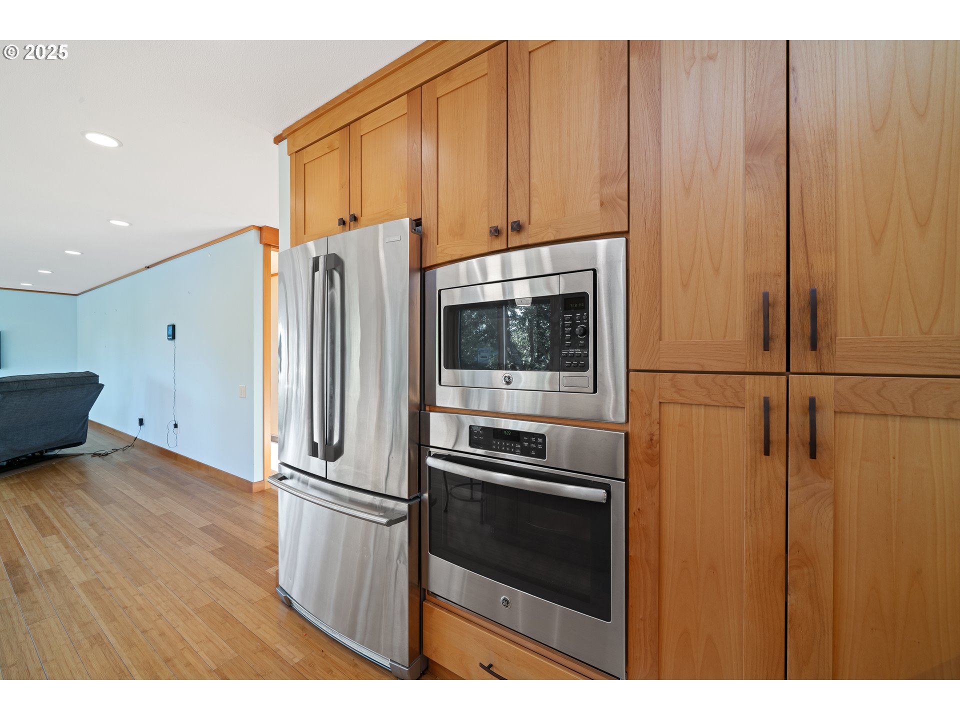15515 Liars Lair Nehalem, OR 97131 - Photo 15 of 46 a kitchen with stainless steel appliances a refrigerator and a stove