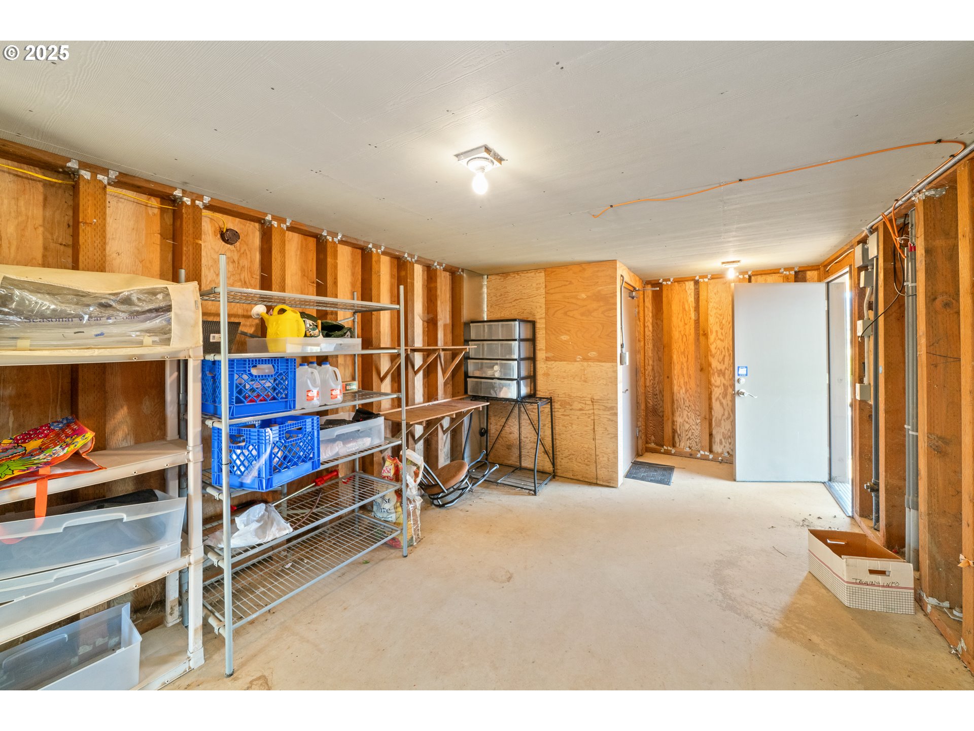 15515 Liars Lair Nehalem, OR 97131 - Photo 28 of 46 a bedroom with furniture and a flat screen tv