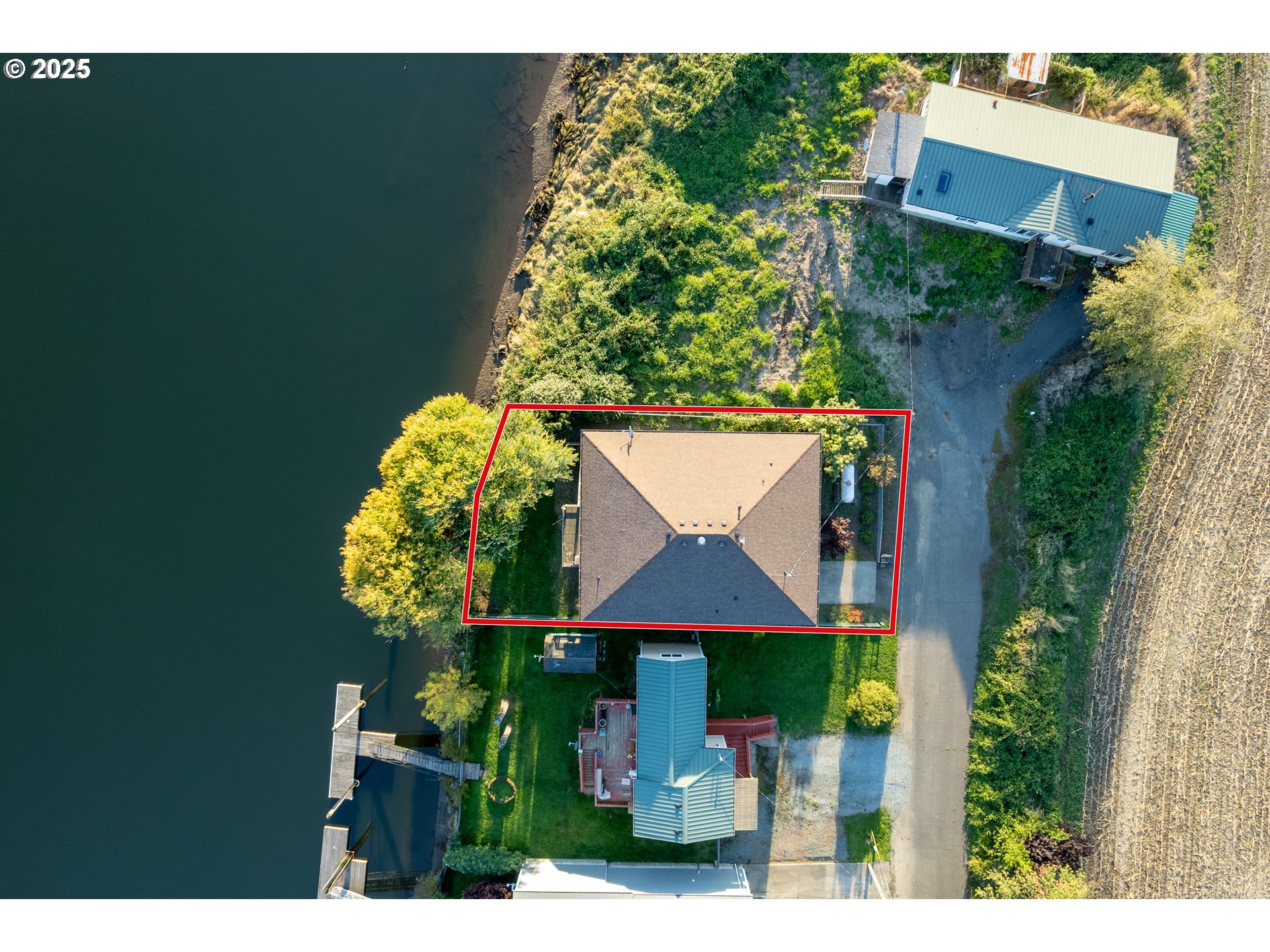 15515 Liars Lair Nehalem, OR 97131 - Photo 3 of 46 a aerial view of a house