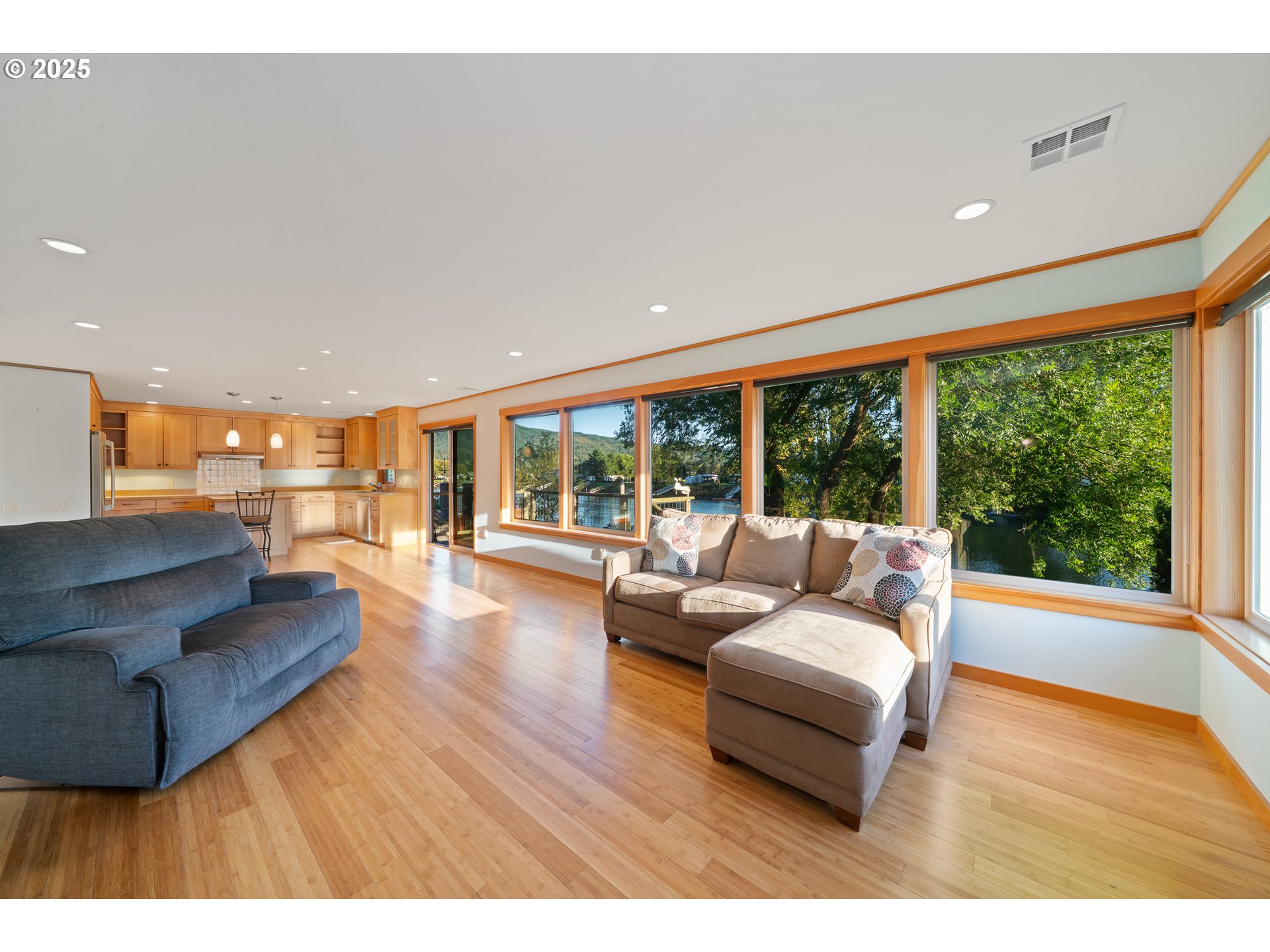15515 Liars Lair Nehalem, OR 97131 - Photo 9 of 46 a living room with furniture and a large window
