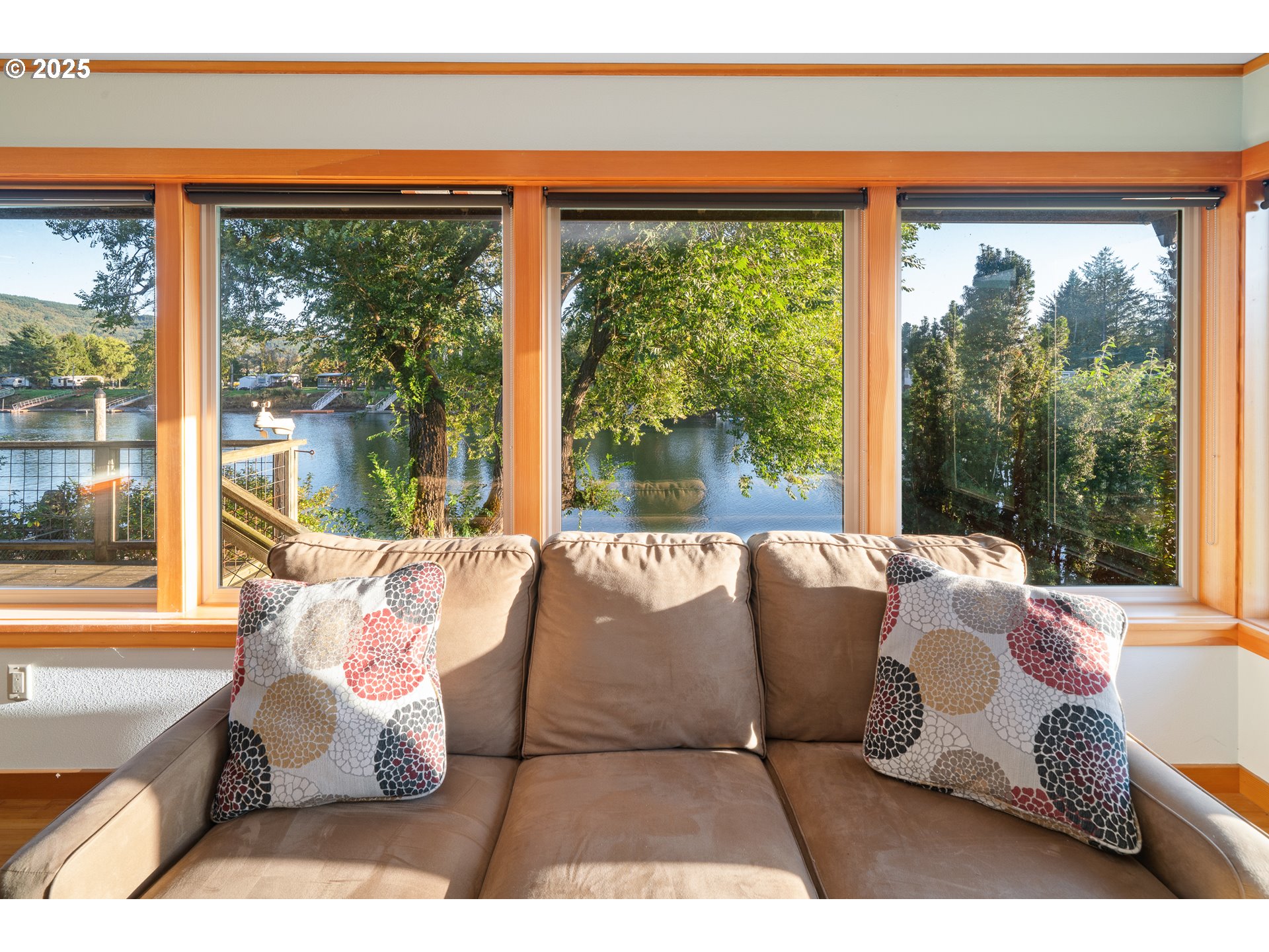 15515 Liars Lair Nehalem, OR 97131 - Photo 10 of 46 a living room with large window