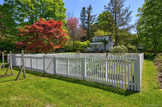 a view of a wooden fence