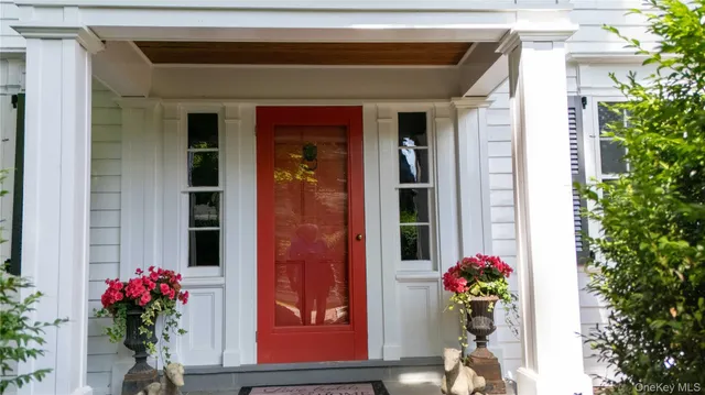 a front view of a house with a porch