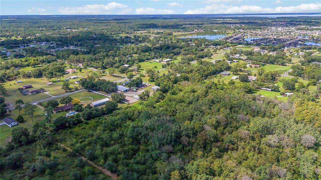 0 Edsel Avenue St. Cloud, FL 34772 - Photo 6 of 38 a view of a city with green field