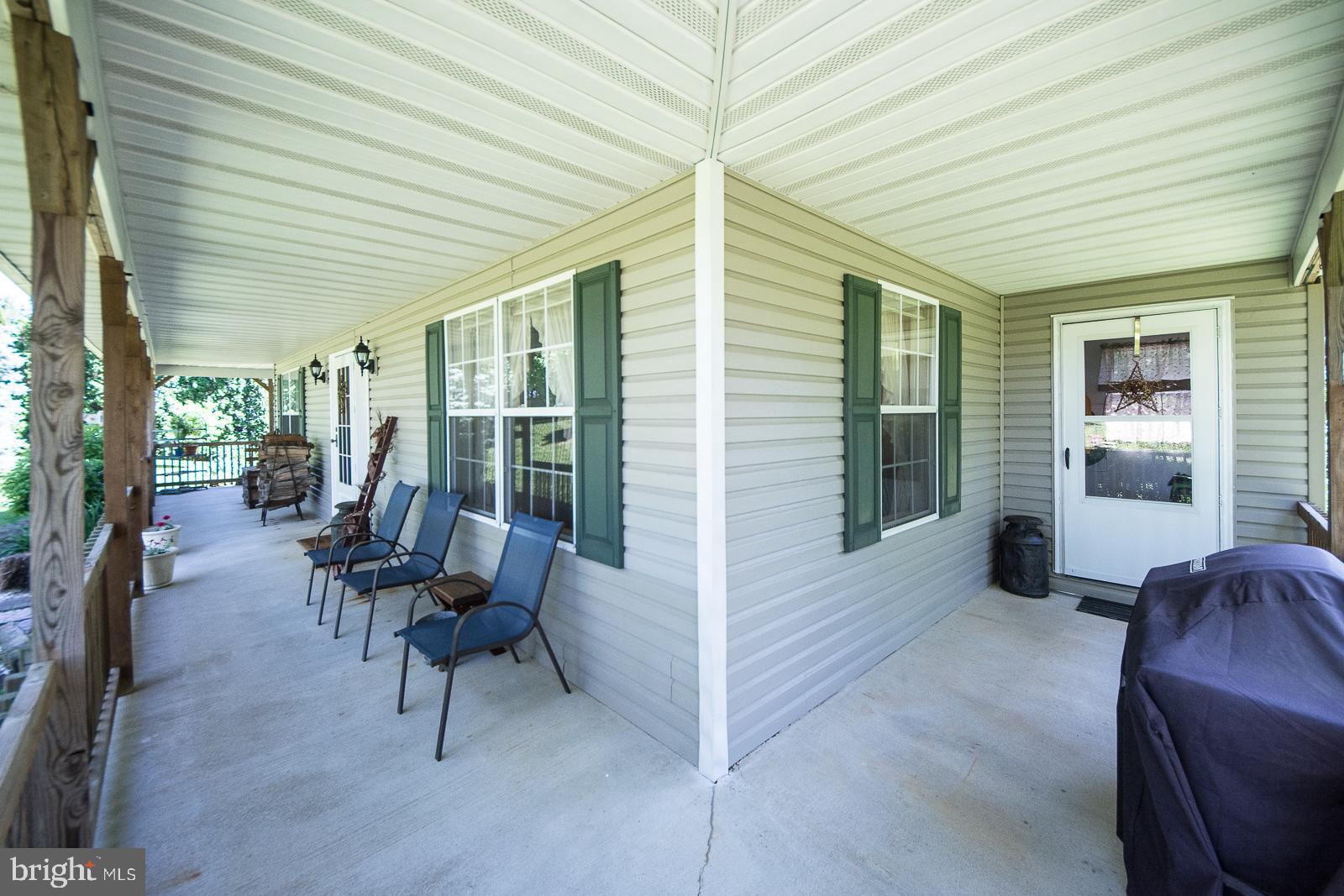 156 Barkley Road Atglen, PA 19310 - Photo 8 of 27 50 x 6 - Wraparound porch