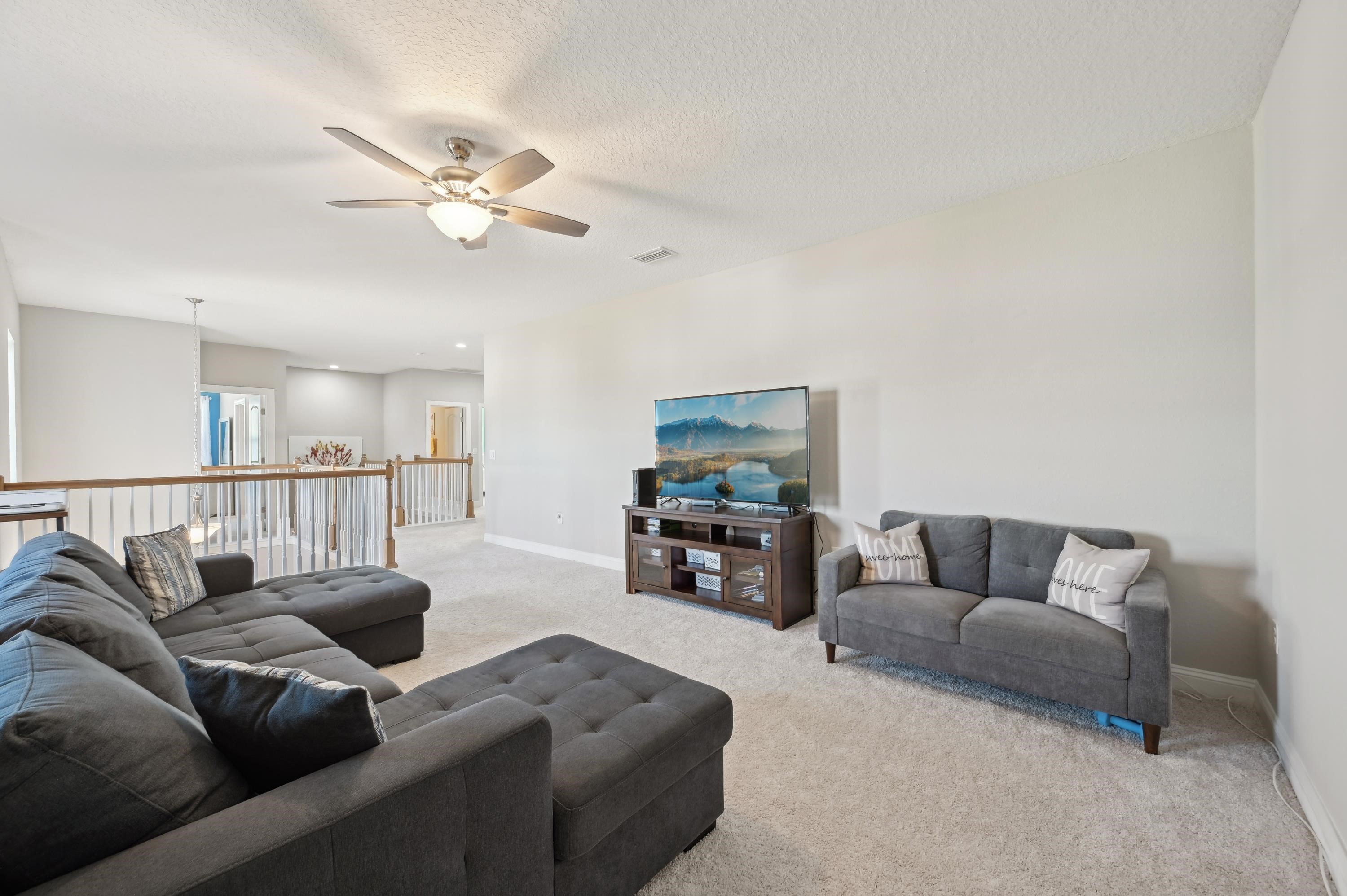 57 Sunset Ridge Court St. Johns, FL 32259 - Photo 32 of 79 a living room with furniture and a flat screen tv
