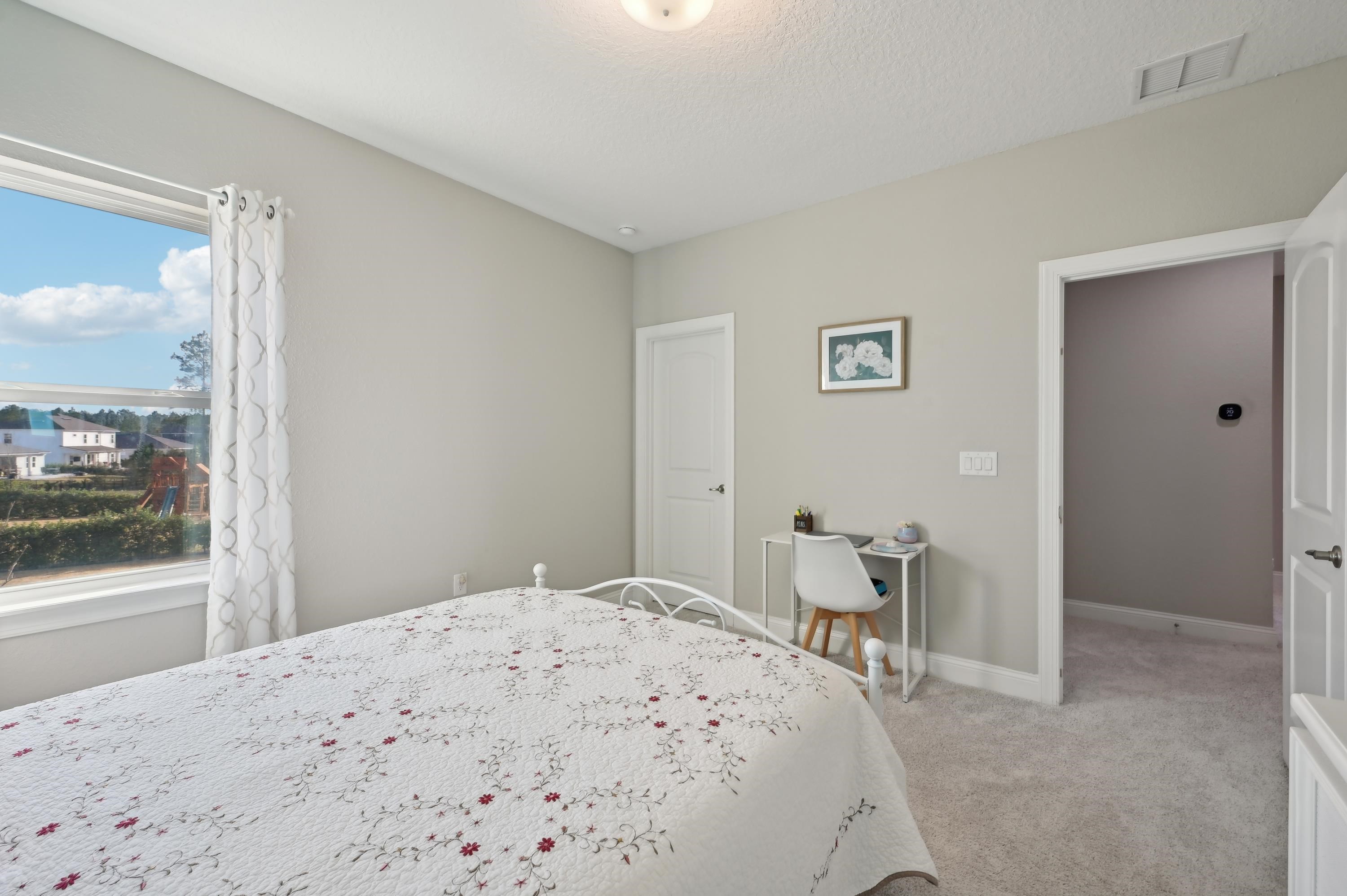 57 Sunset Ridge Court St. Johns, FL 32259 - Photo 38 of 79 a bedroom with a bed and a dresser