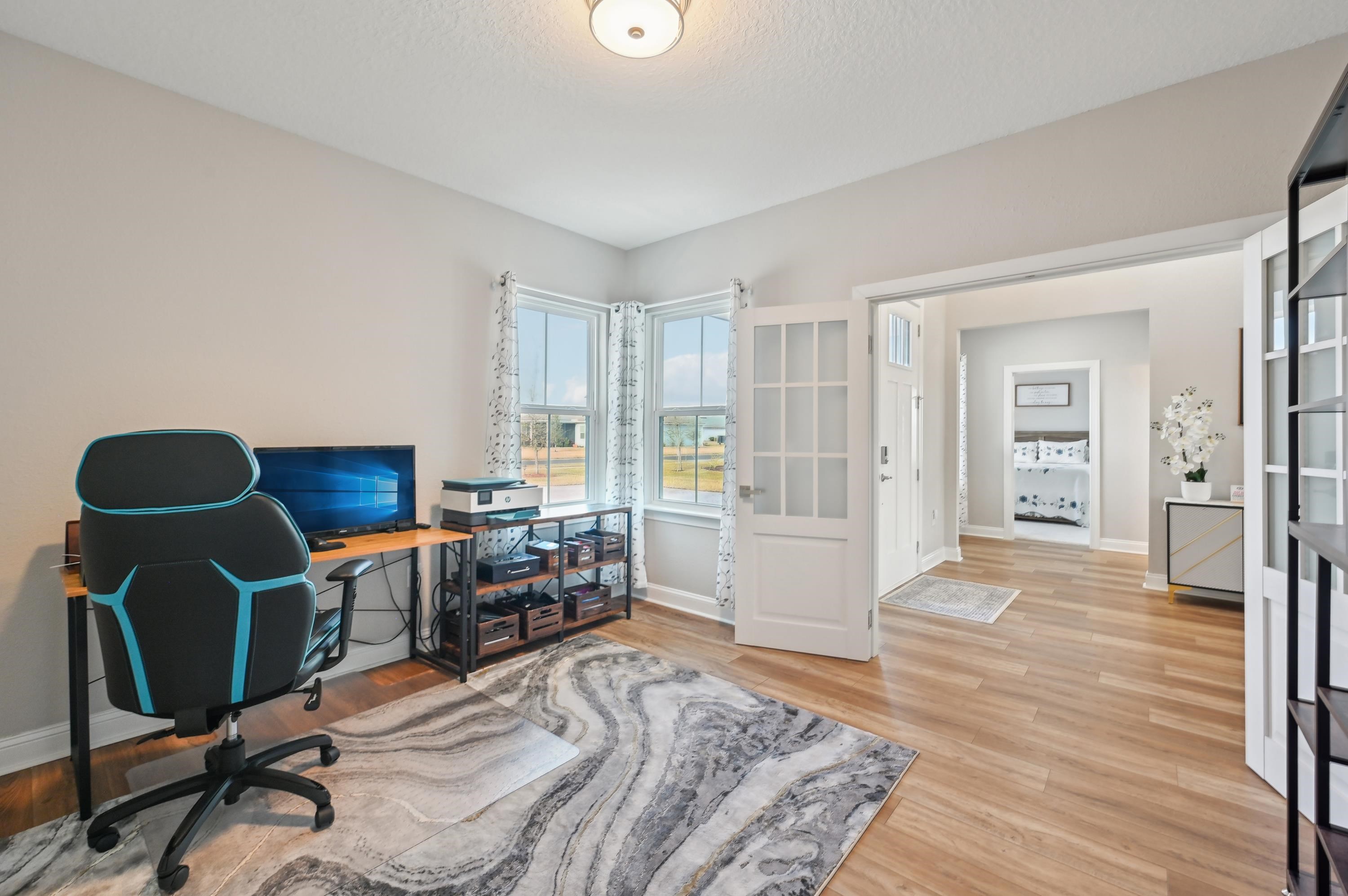 57 Sunset Ridge Court St. Johns, FL 32259 - Photo 56 of 79 a bedroom with furniture and a wooden floor
