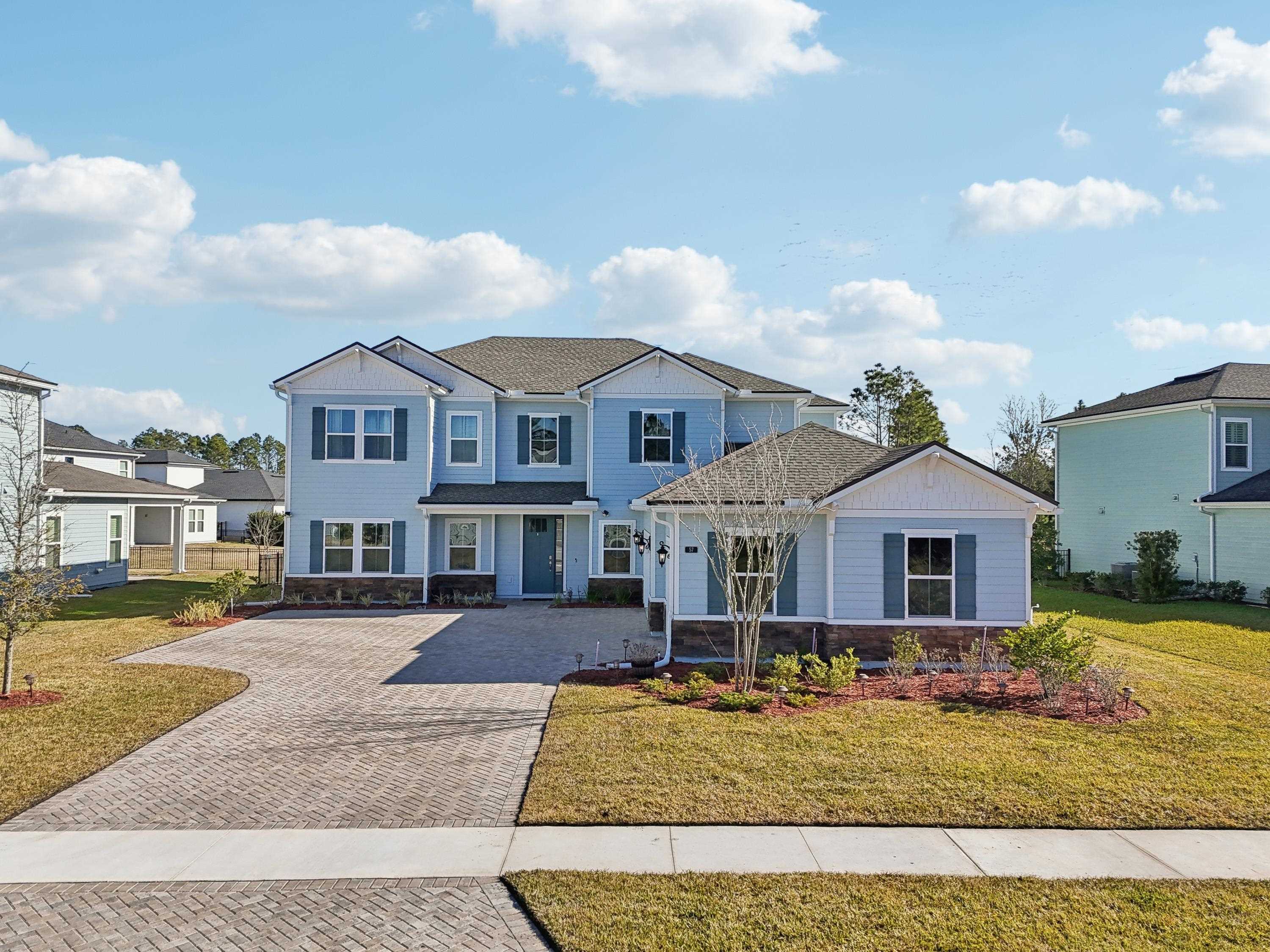 57 Sunset Ridge Court St. Johns, FL 32259 - Photo 63 of 79 a front view of a house with a yard