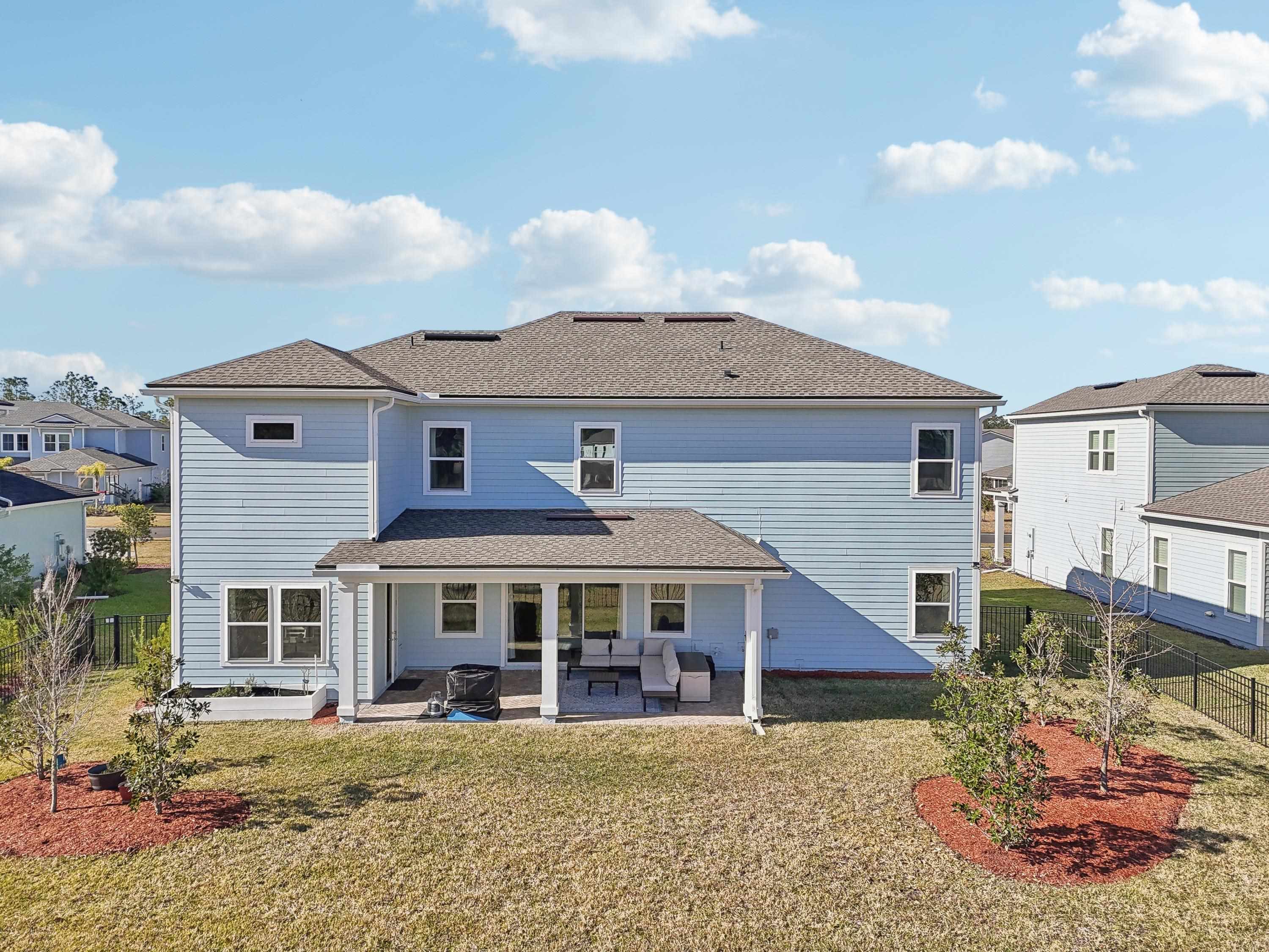 57 Sunset Ridge Court St. Johns, FL 32259 - Photo 70 of 79 a front view of a house with a yard