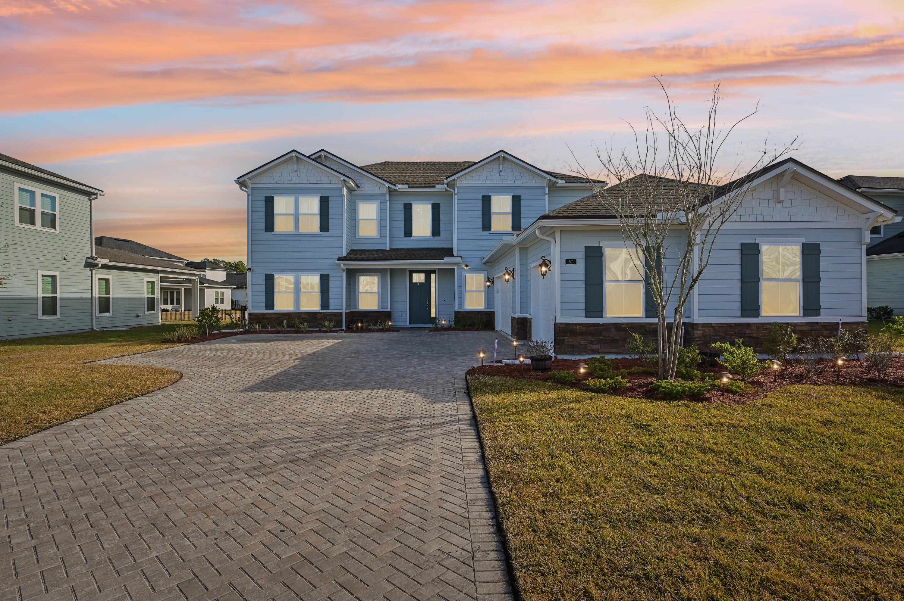 57 Sunset Ridge Court St. Johns, FL 32259 - Photo 79 of 79 a front view of a house with a yard