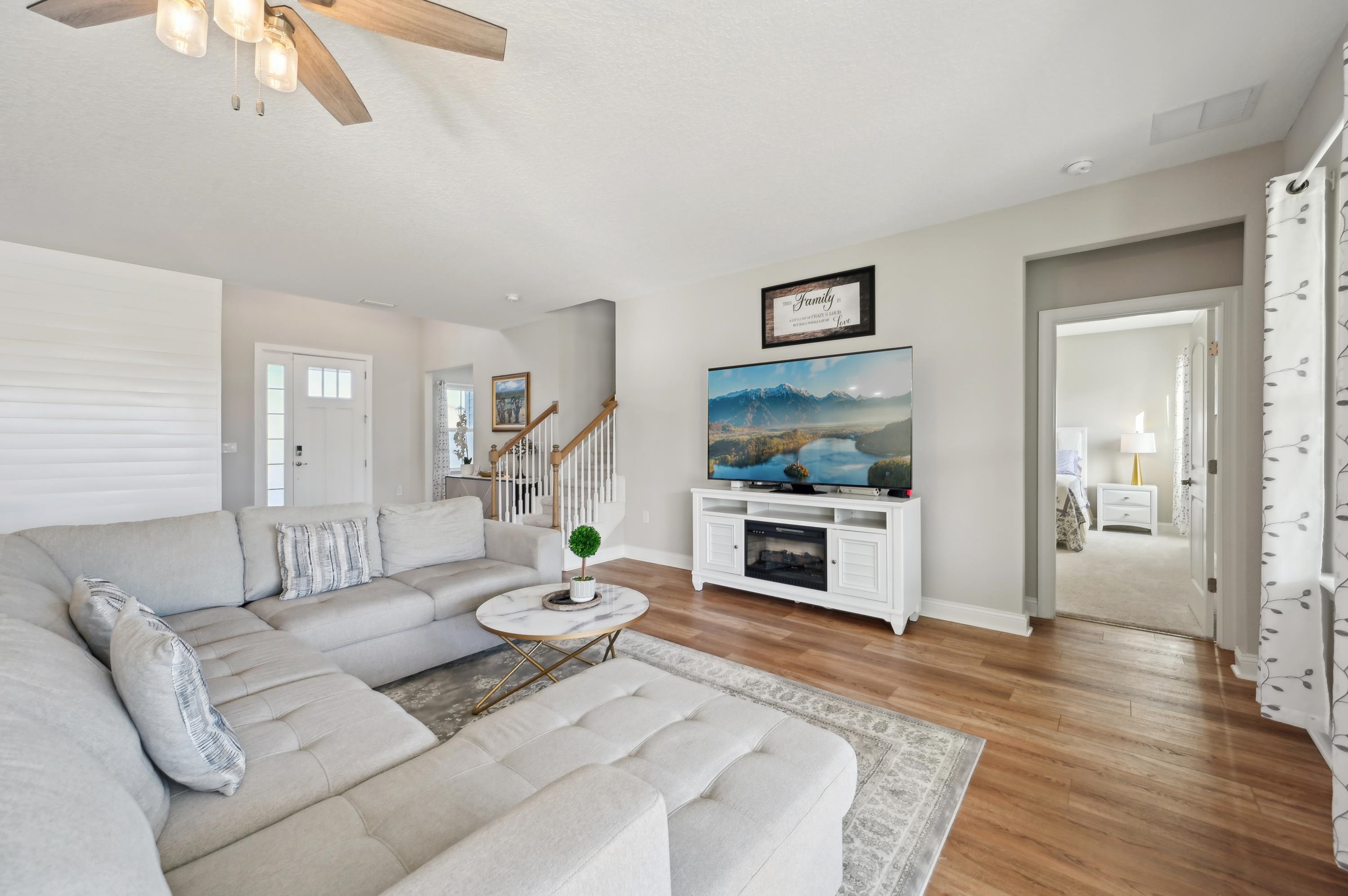57 Sunset Ridge Court St. Johns, FL 32259 - Photo 9 of 79 a living room with furniture and a flat screen tv