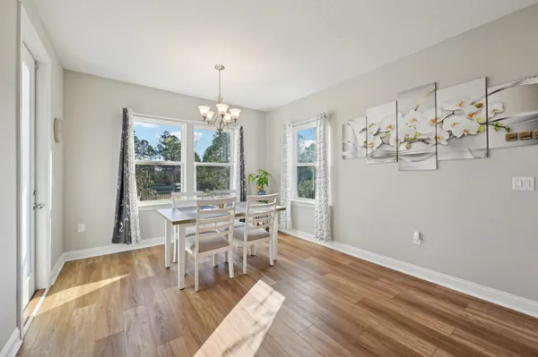 a kitchen with stainless steel appliances granite countertop a stove refrigerator sink and cabinets