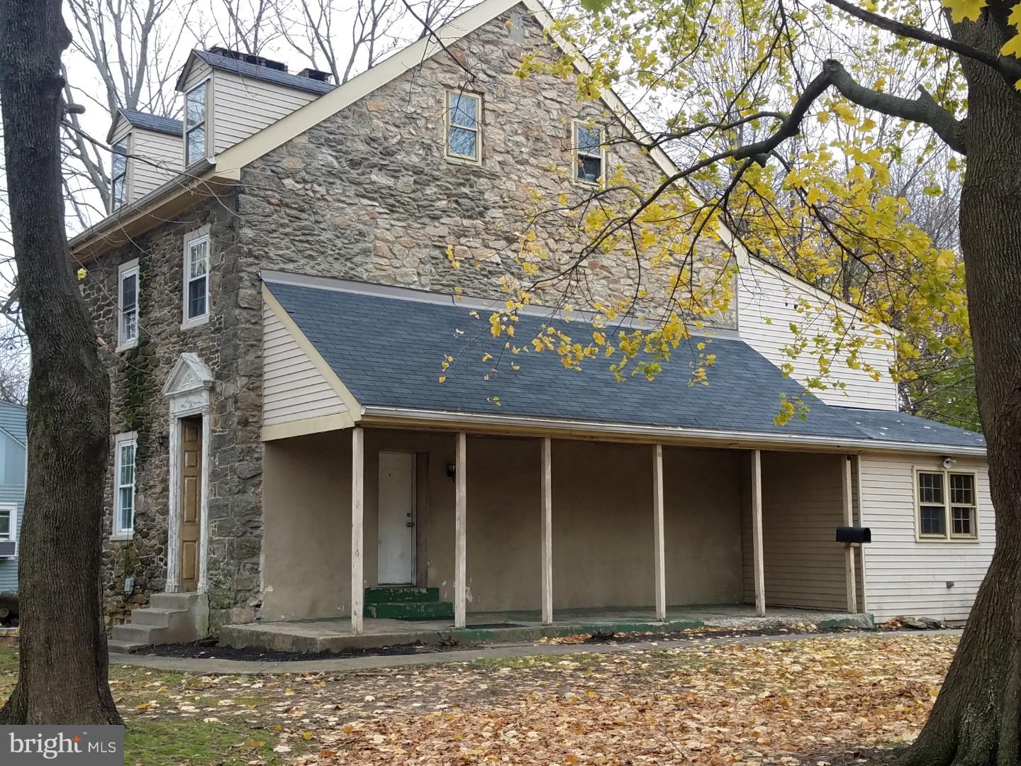 12965 Townsend Road Philadelphia, PA 19154 - Photo 10 of 10 a front view of a house with a yard and garage