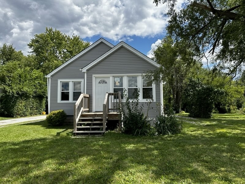 15955 State Street South Holland, IL 60473 - Photo 1 of 9 a view of a house with a back yard