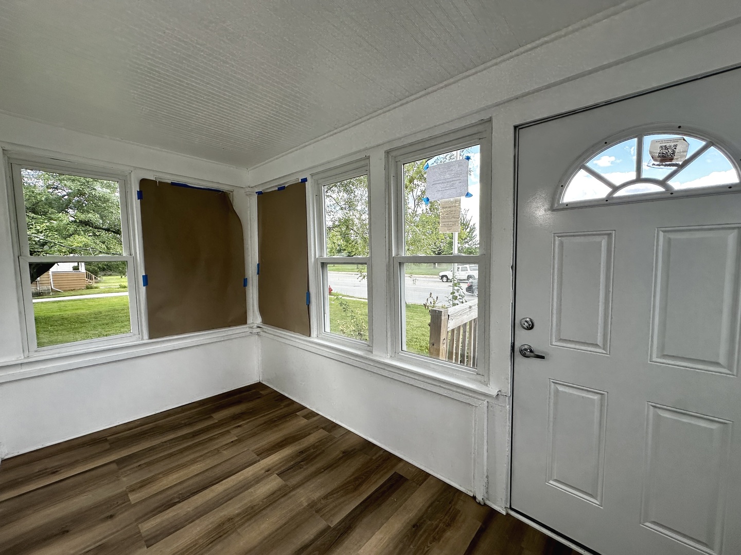 15955 State Street South Holland, IL 60473 - Photo 2 of 9 a view of an empty room with wooden floor and a window