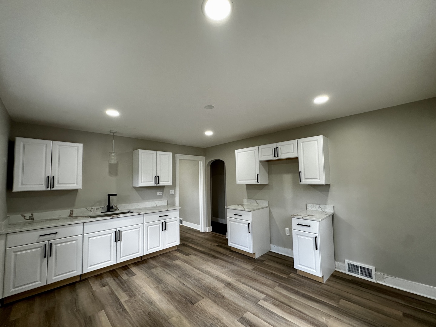 15955 State Street South Holland, IL 60473 - Photo 5 of 9 a kitchen with granite countertop a sink cabinets and stainless steel appliances