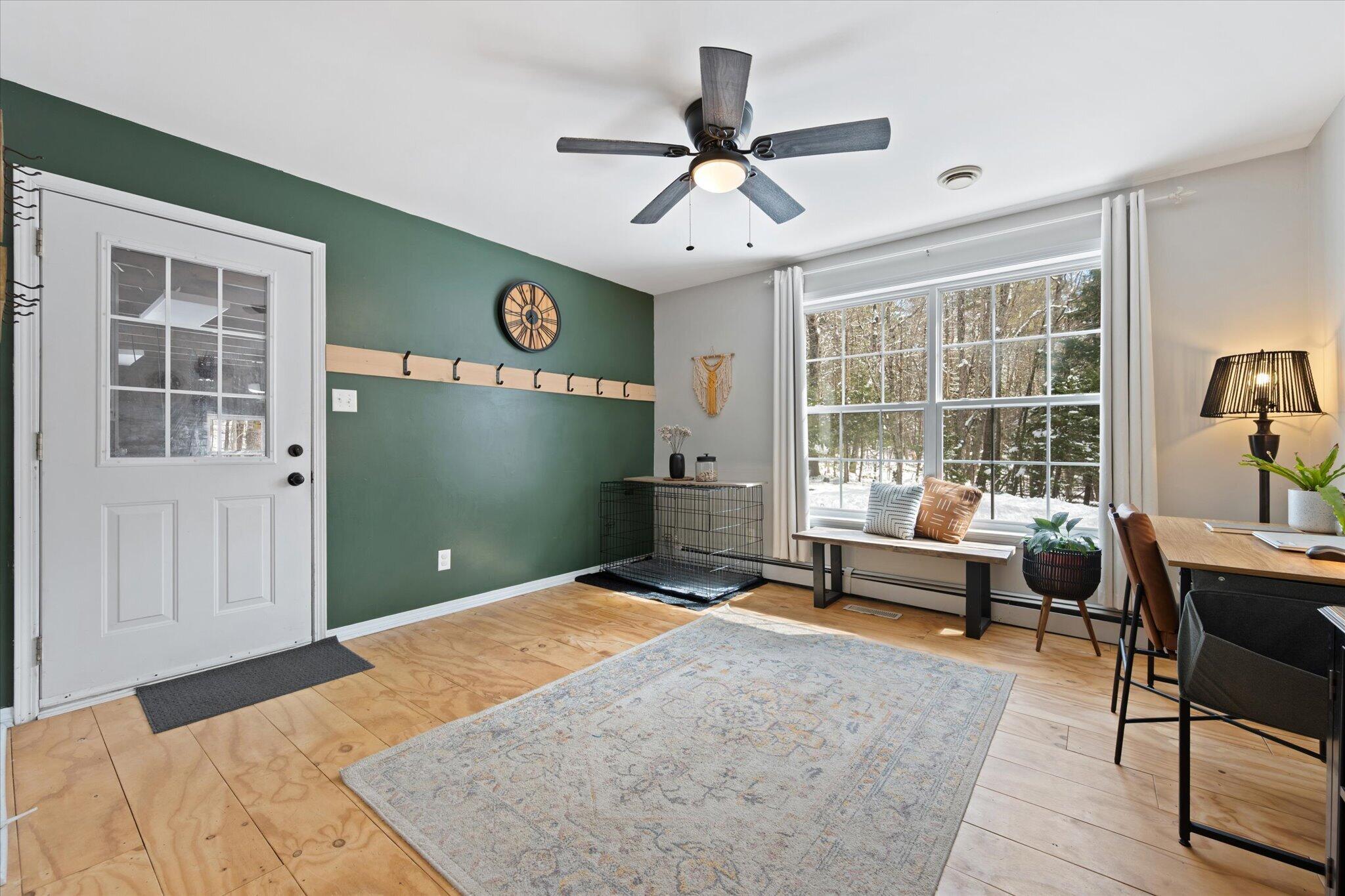 817 Millvale Road Bucksport, ME 04416 - Photo 7 of 47 06-Family Room, Door to Garage