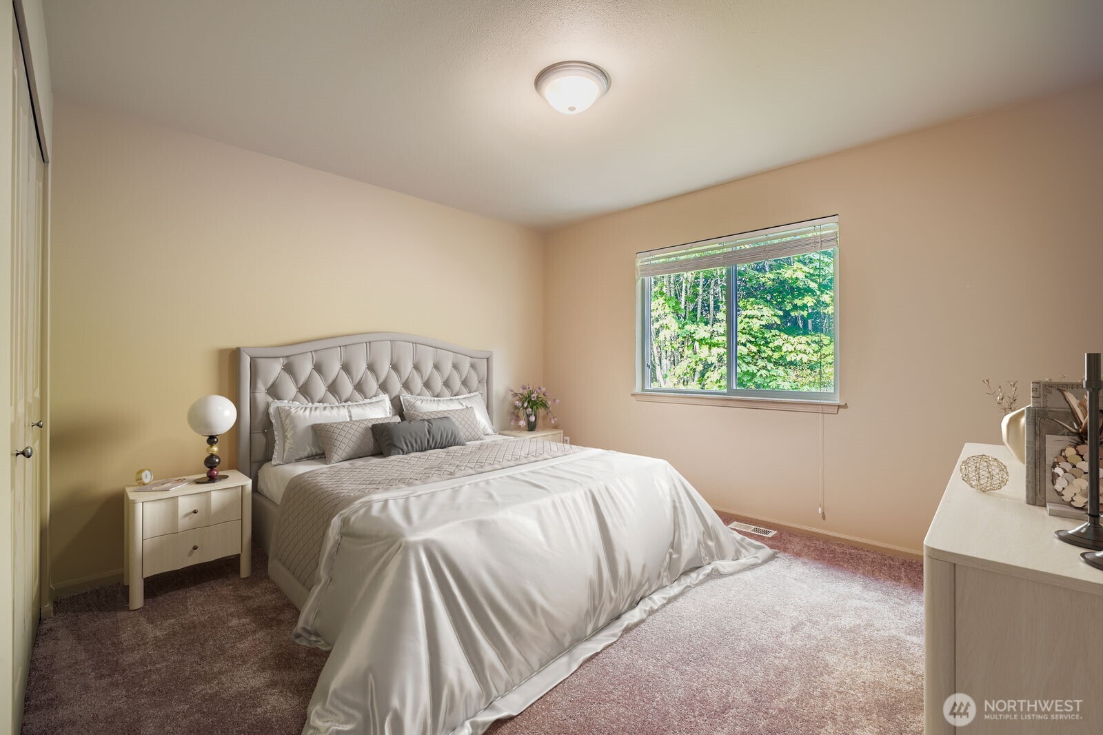16200 Parkside Way Southeast Renton, WA 98058 - Photo 12 of 40 a bedroom with a bed and a window
