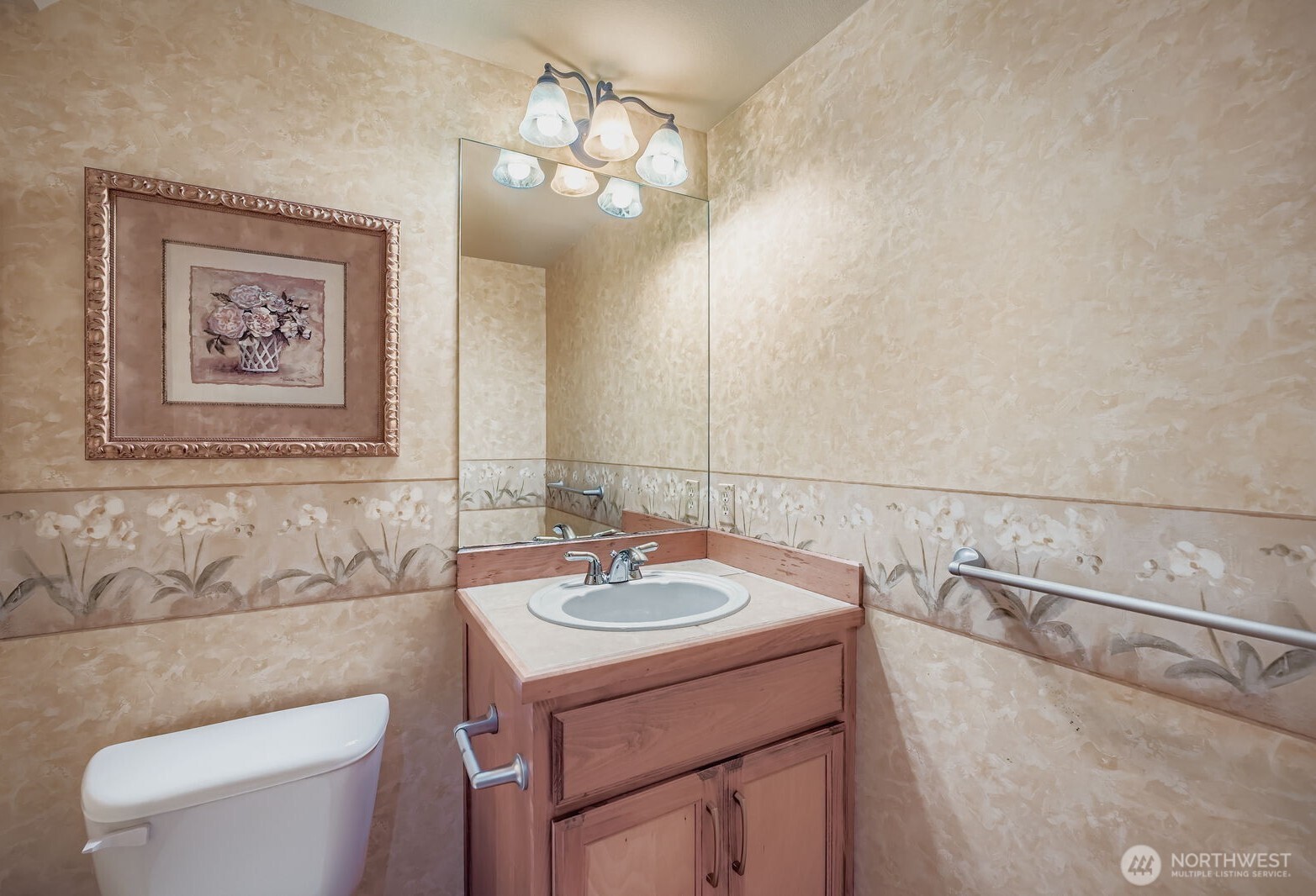 16200 Parkside Way Southeast Renton, WA 98058 - Photo 16 of 40 a bathroom with a toilet a sink and mirror