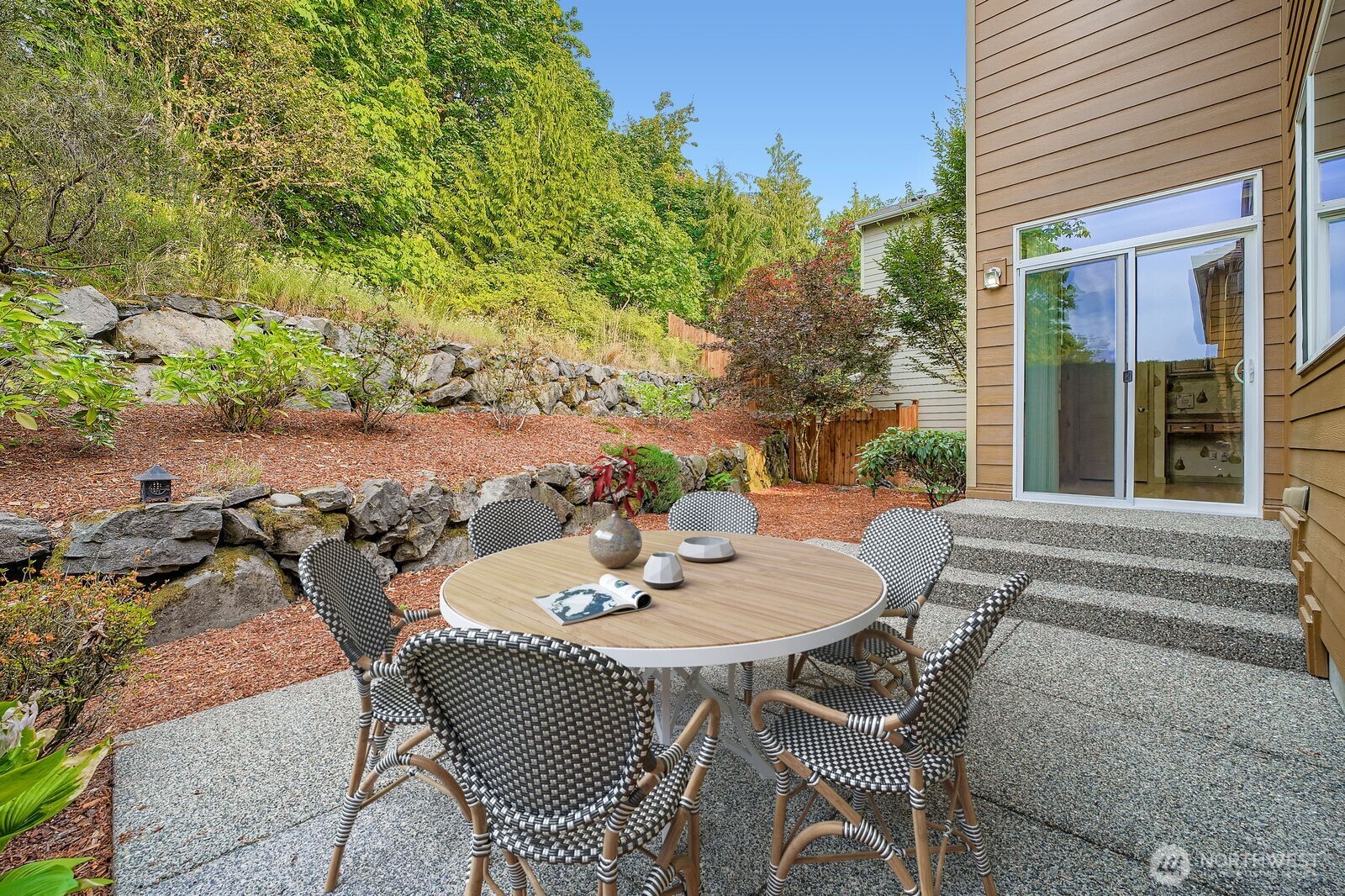 16200 Parkside Way Southeast Renton, WA 98058 - Photo 22 of 40 a view of a patio with a table and chairs