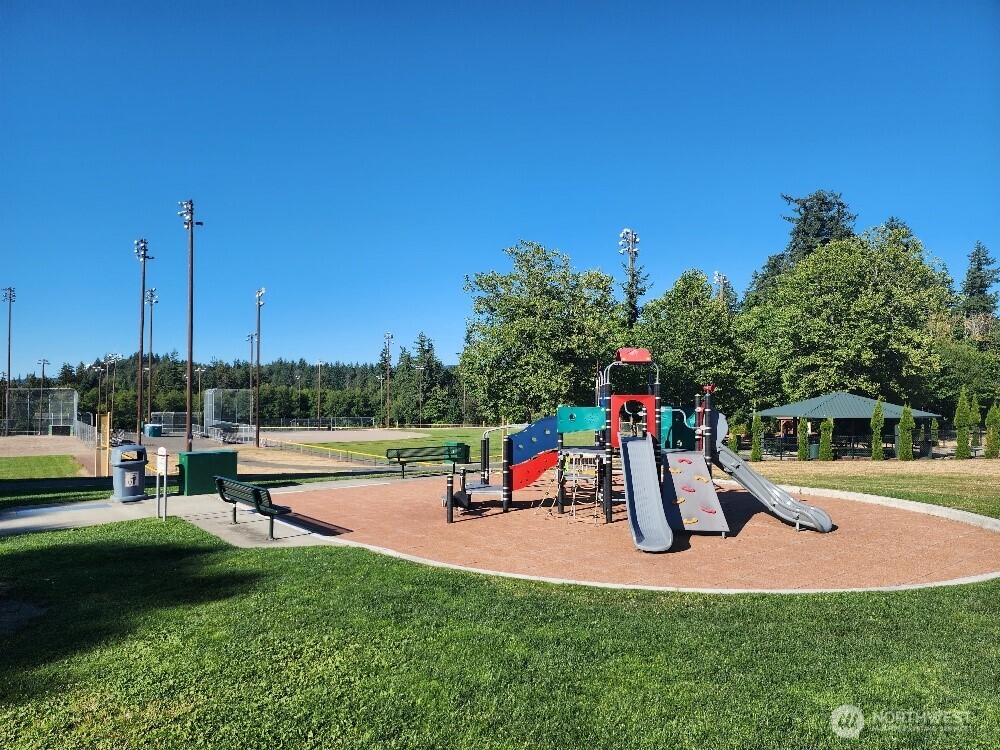 16200 Parkside Way Southeast Renton, WA 98058 - Photo 33 of 40 a park with lots of swings and slides