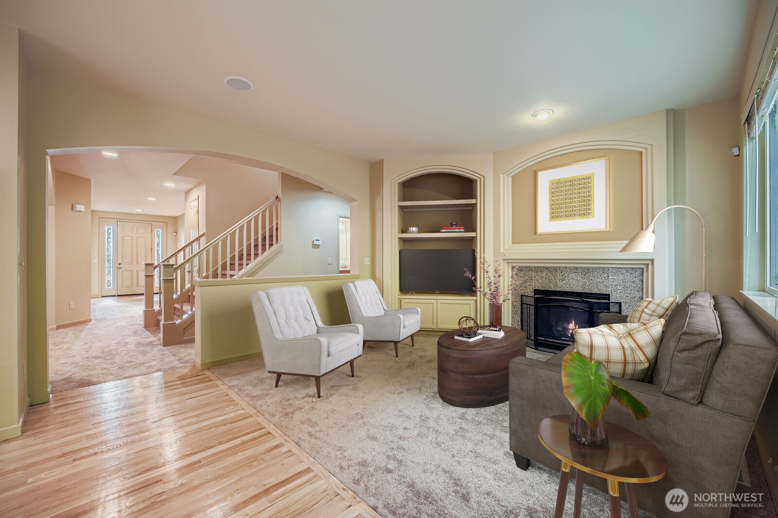 16200 Parkside Way Southeast Renton, WA 98058 - Photo 6 of 40 a living room with furniture and a fireplace