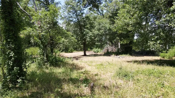 a view of swimming pool with a yard