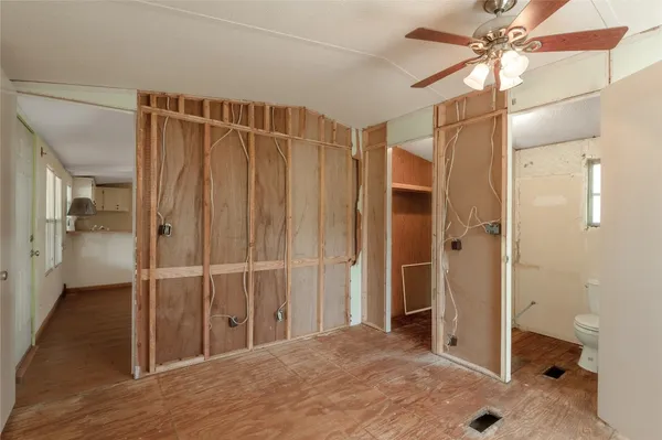 a view of a bathroom with a shower and a tub