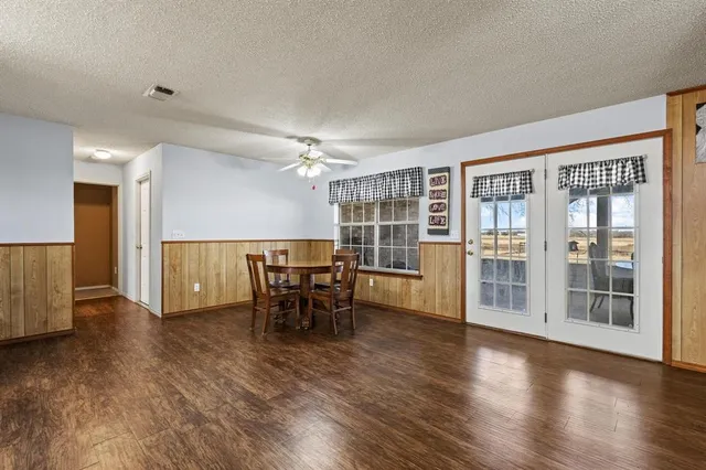 a view of a livingroom with furniture and wooden floor