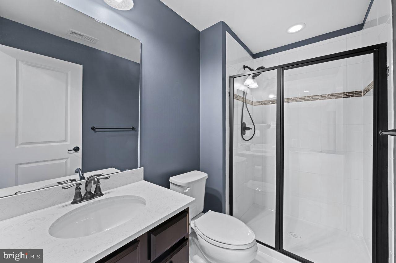 3026 Sunny Ridge Drive Odenton, MD 21113 - Photo 30 of 49 Sleek modern bathroom with stylish accents.