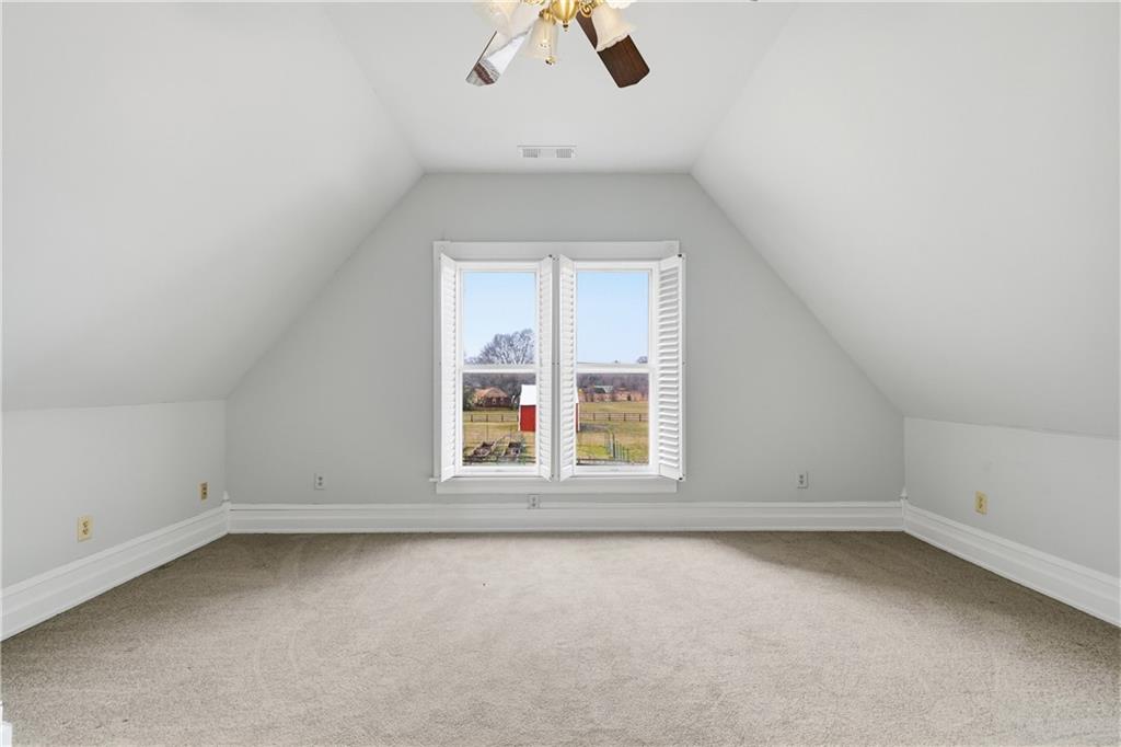 880 Johnstonville Road Barnesville, GA 30204 - Photo 25 of 33 an empty room with a empty space and a window