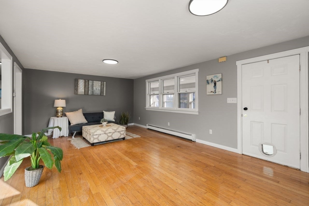 a bedroom with bed and a window