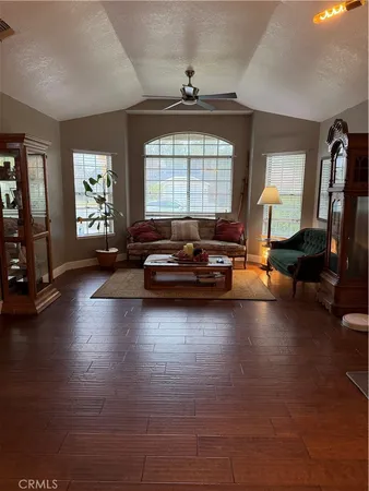 a view of a house with backyard and porch
