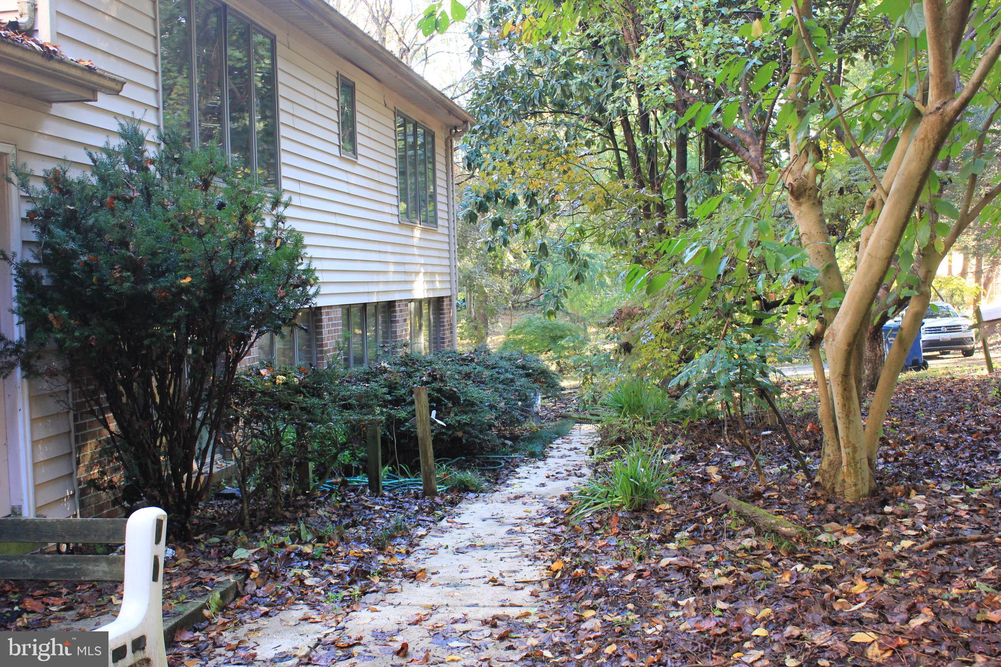 5510 Stephen Reid Road Huntingtown, MD 20639 - Photo 26 of 59 a view of a house with a yard and plants