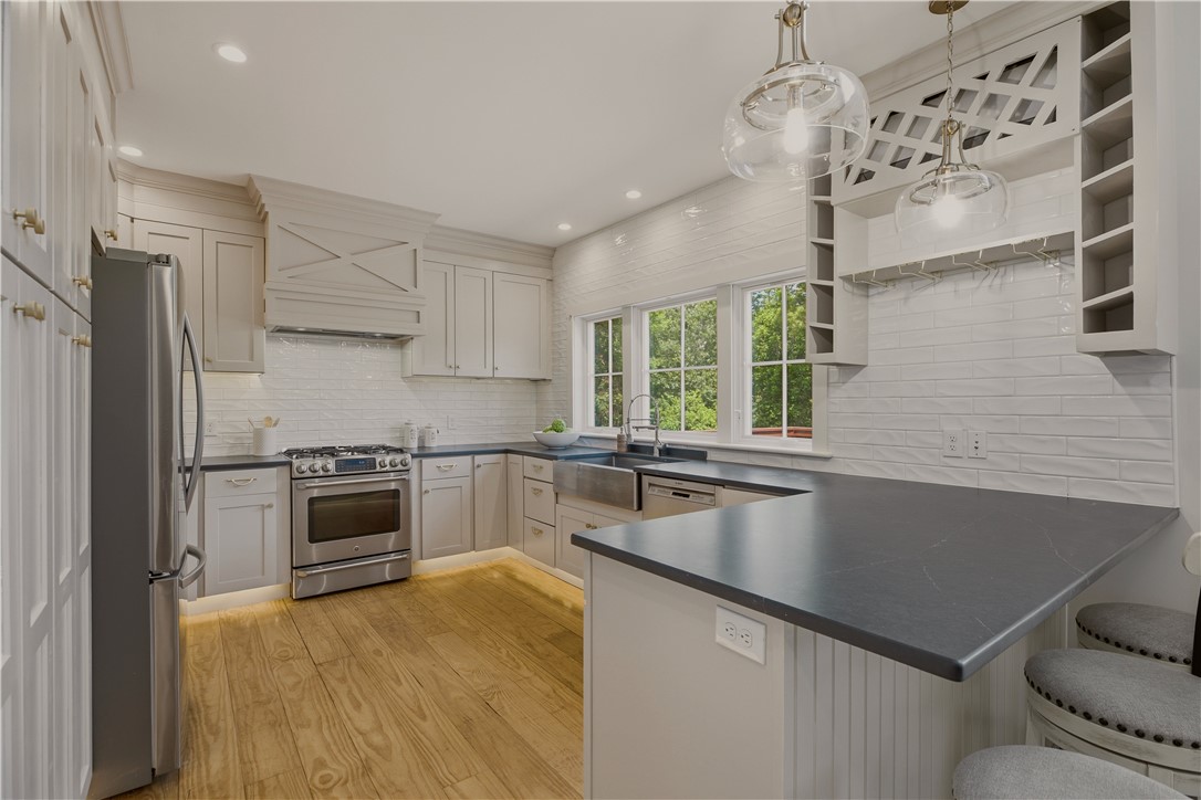 26 Old Stone Church Road Little Compton, RI 02837 - Photo 16 of 49 Lighted kickboards add to the kitchen's ambiance