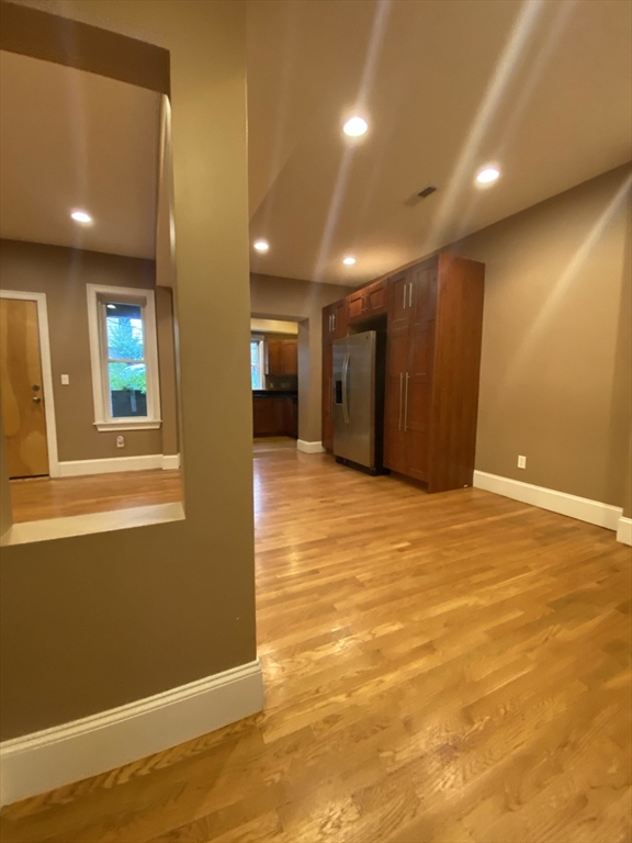 1592 Beacon Street, Unit 2 Brookline, MA 02446 - Photo 4 of 10 a view of an empty room