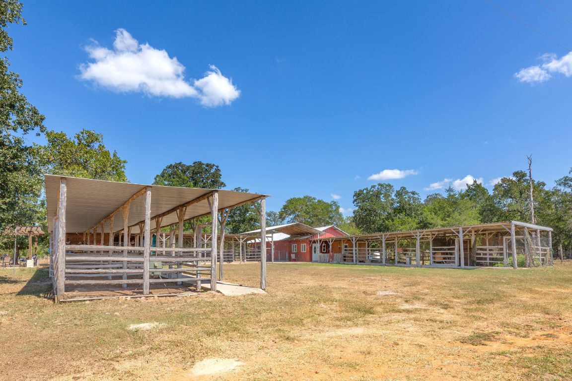 274 Old Potato Road Paige, TX 78659 - Photo 30 of 40 a view of a house with a yard