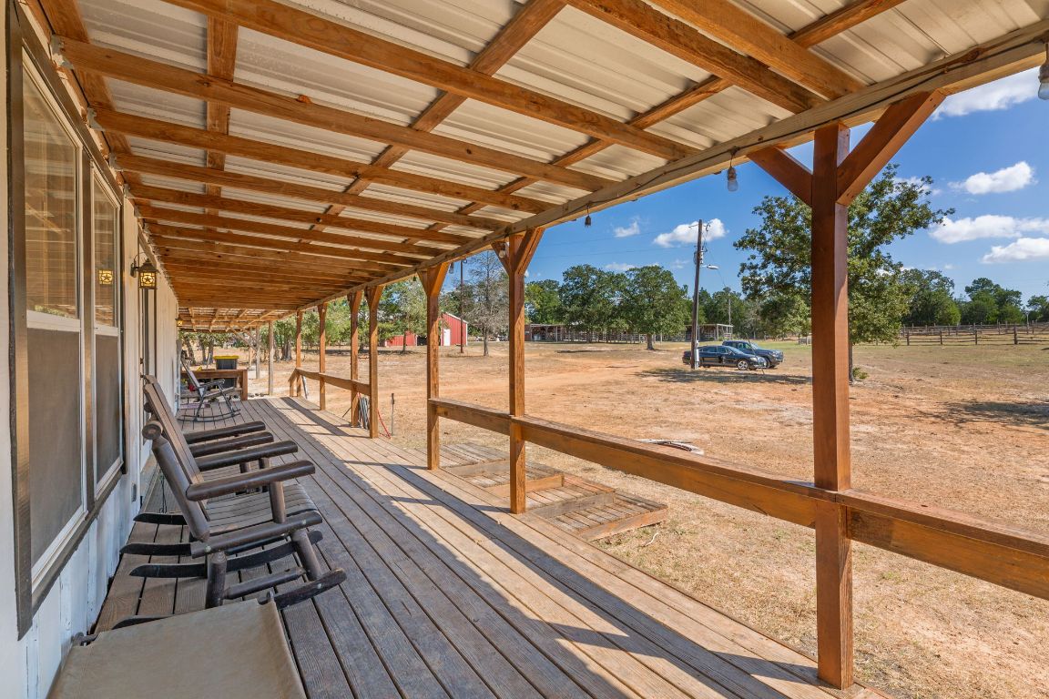 274 Old Potato Road Paige, TX 78659 - Photo 3 of 40 a view of a patio with wooden floor